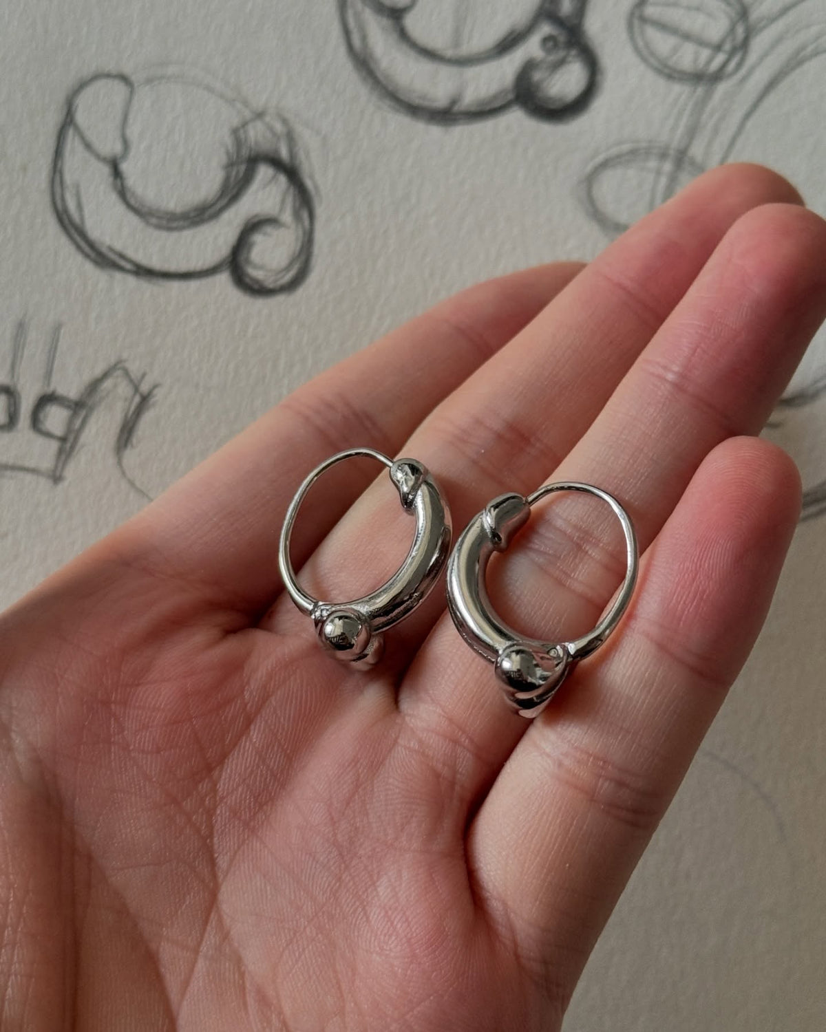 < Pretty nice d*ck > earrings